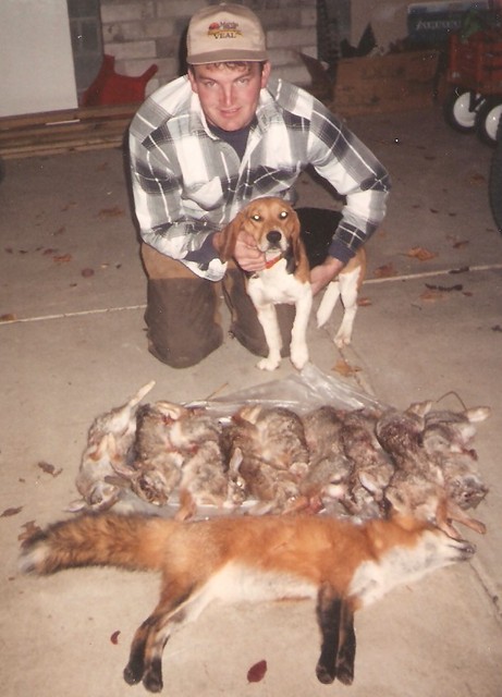 Joe Lane with 9 Rabbits and a Red Fox